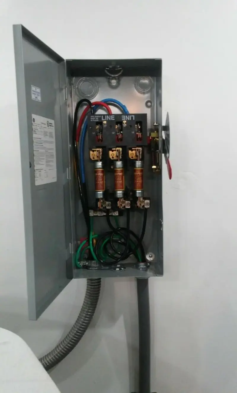 Three-phase disconnect switch installed for Smoke Detector Installation in Brown